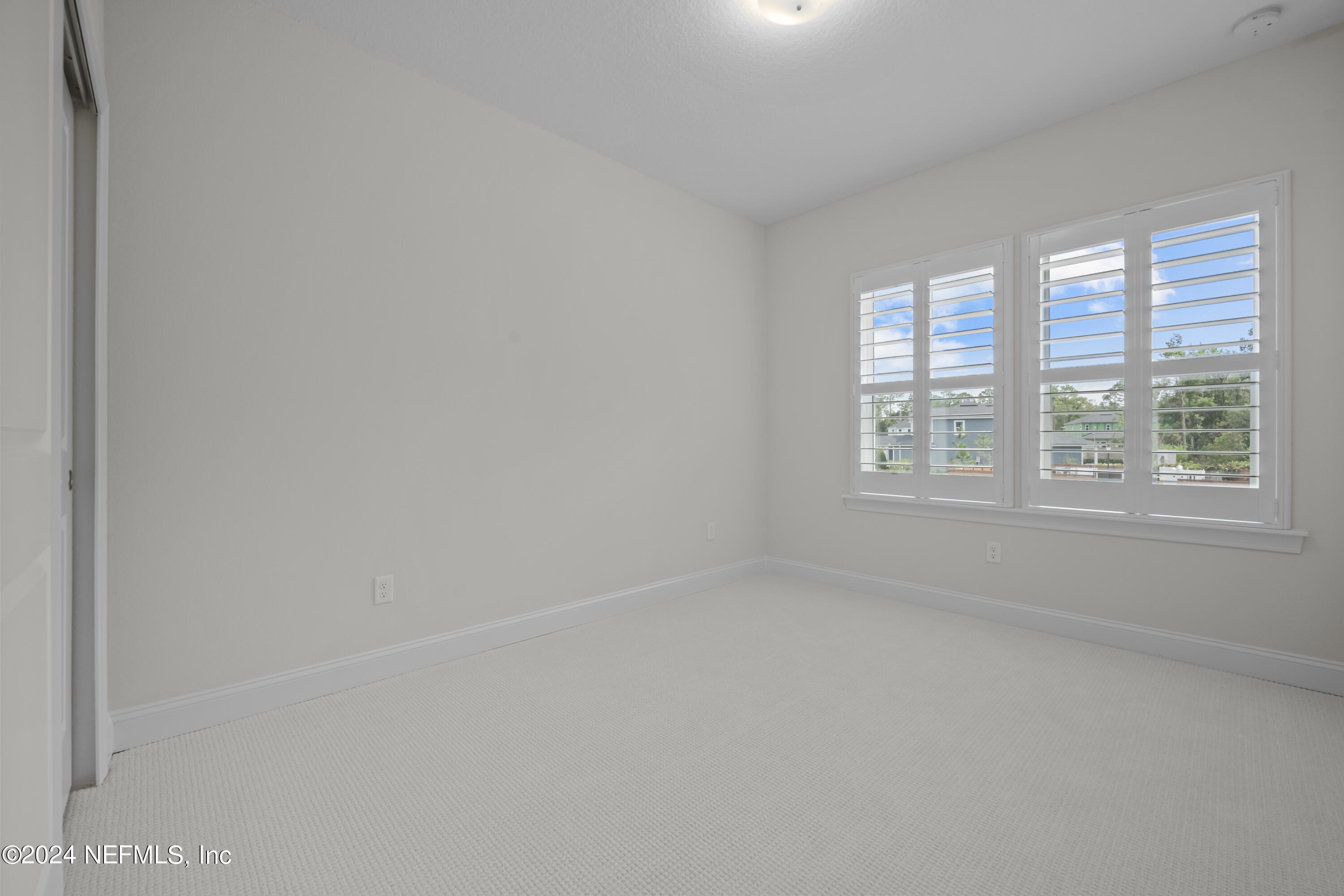 23 Oak Pk Drive St. Johns, FL 32259 - Photo 37 of 72 an empty room with a window