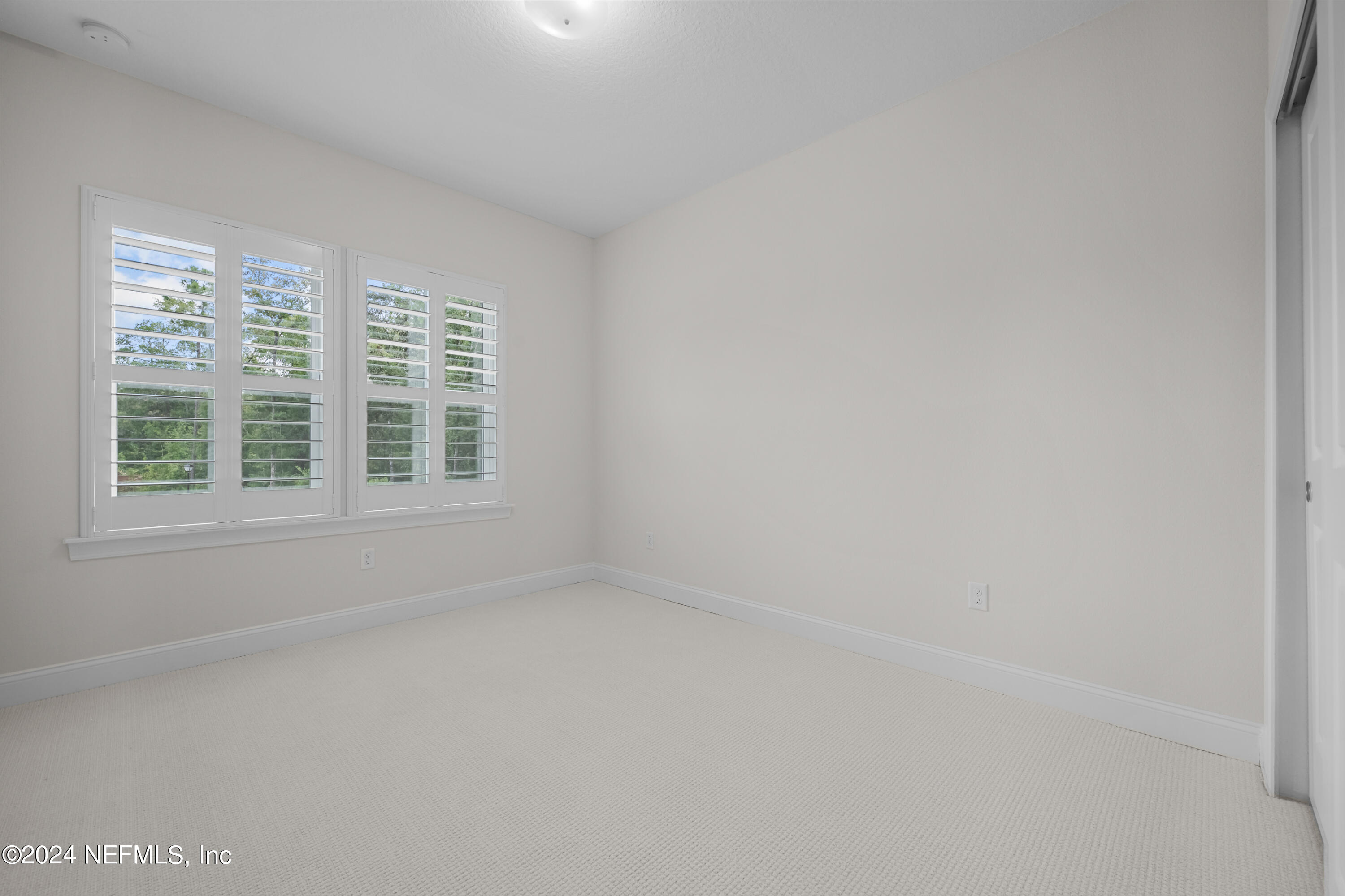 23 Oak Pk Drive St. Johns, FL 32259 - Photo 39 of 72 an empty room with a window