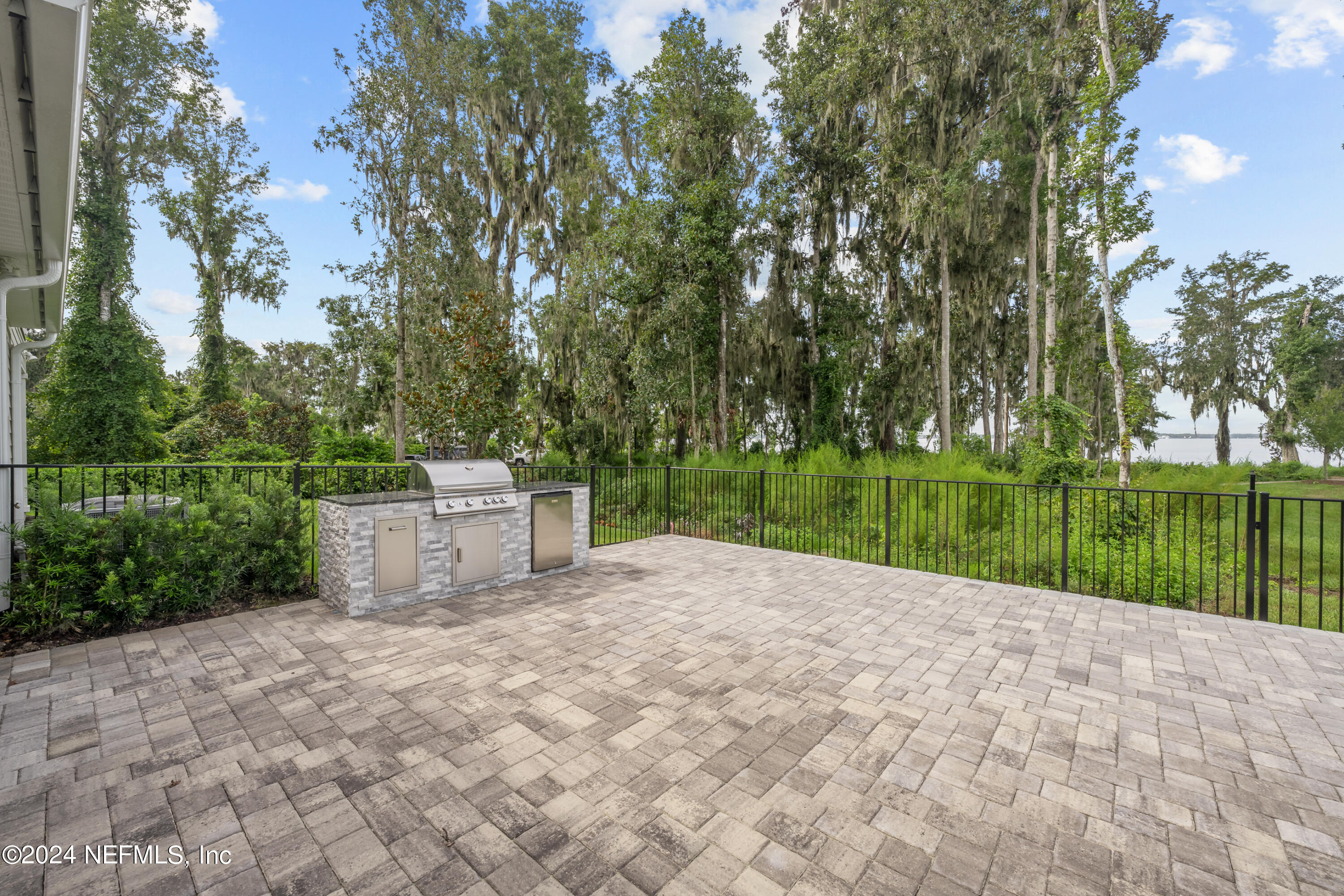 23 Oak Pk Drive St. Johns, FL 32259 - Photo 45 of 72 a view of a chair and a table in the garden