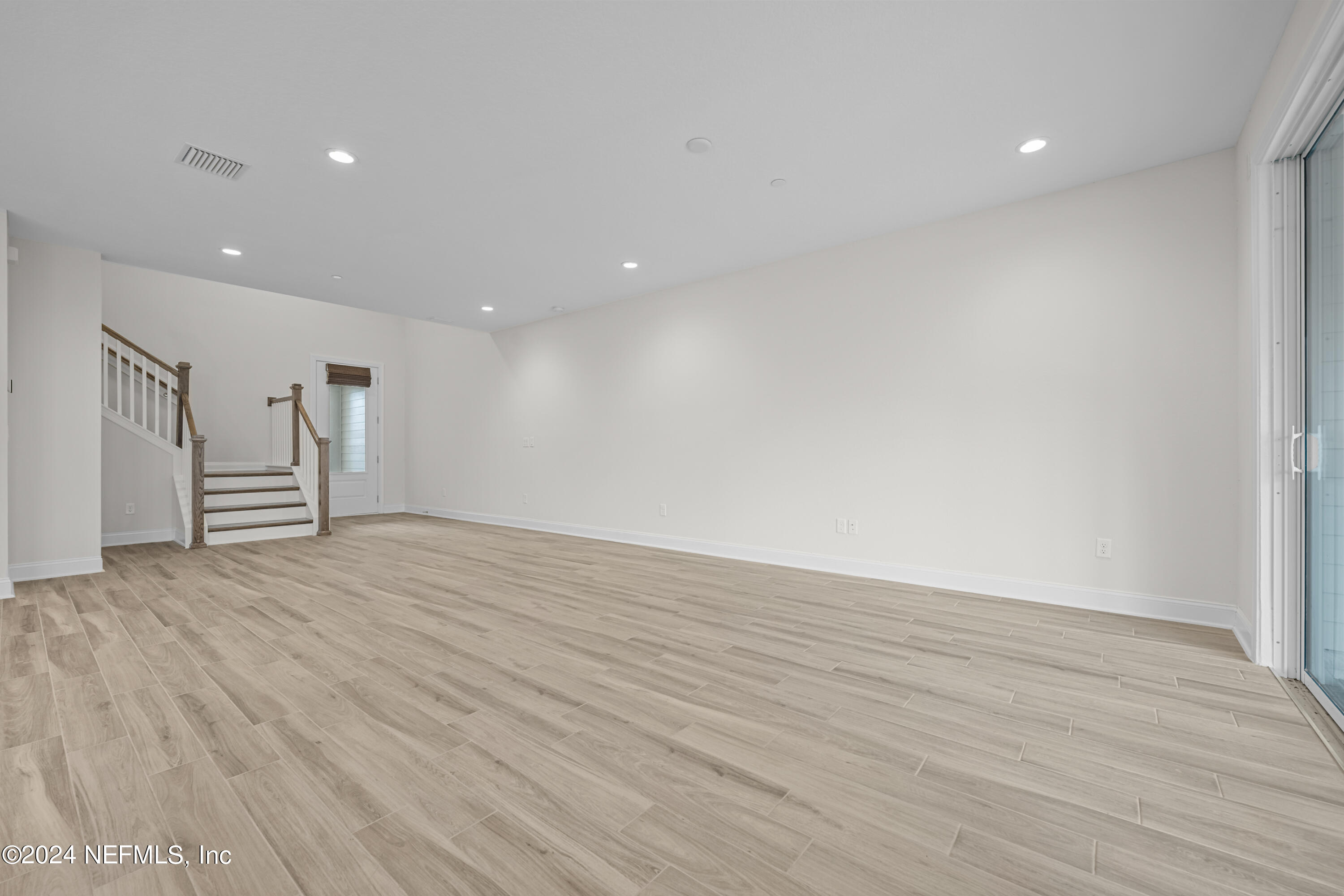 23 Oak Pk Drive St. Johns, FL 32259 - Photo 9 of 72 a view of empty room with wooden floor