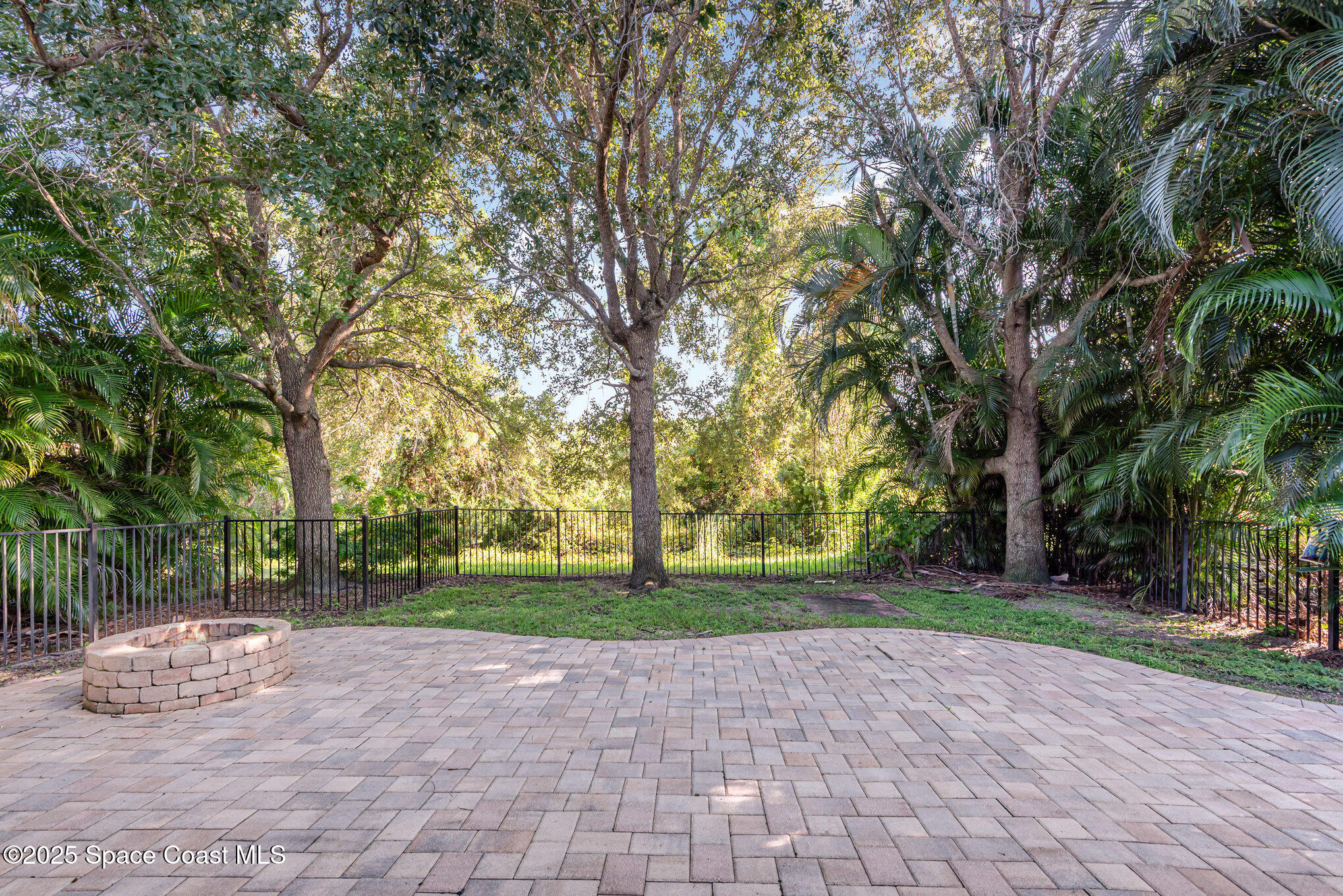 1247 Hasley Place Melbourne, FL 32940 - Photo 24 of 33 a view of a park with large trees