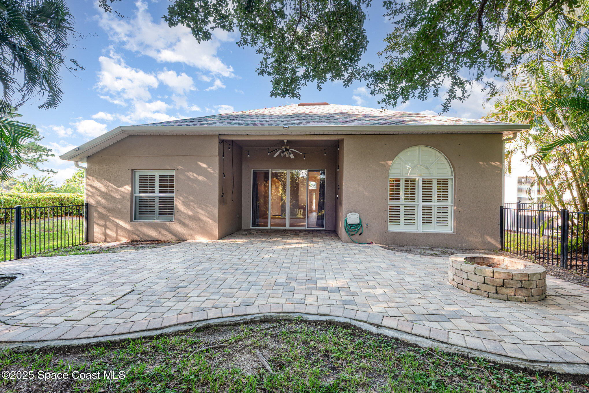1247 Hasley Place Melbourne, FL 32940 - Photo 26 of 33 a front view of a house with garden