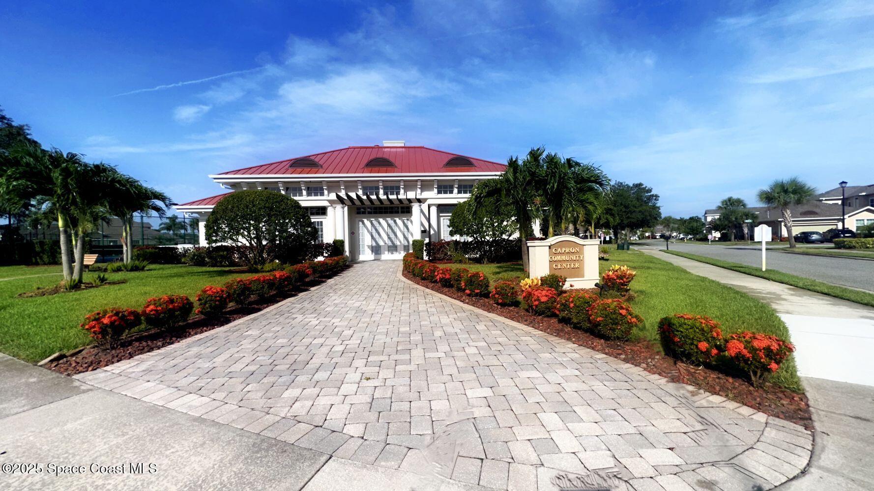 1247 Hasley Place Melbourne, FL 32940 - Photo 29 of 33 a view of a house with swimming pool yard fire pit and slide