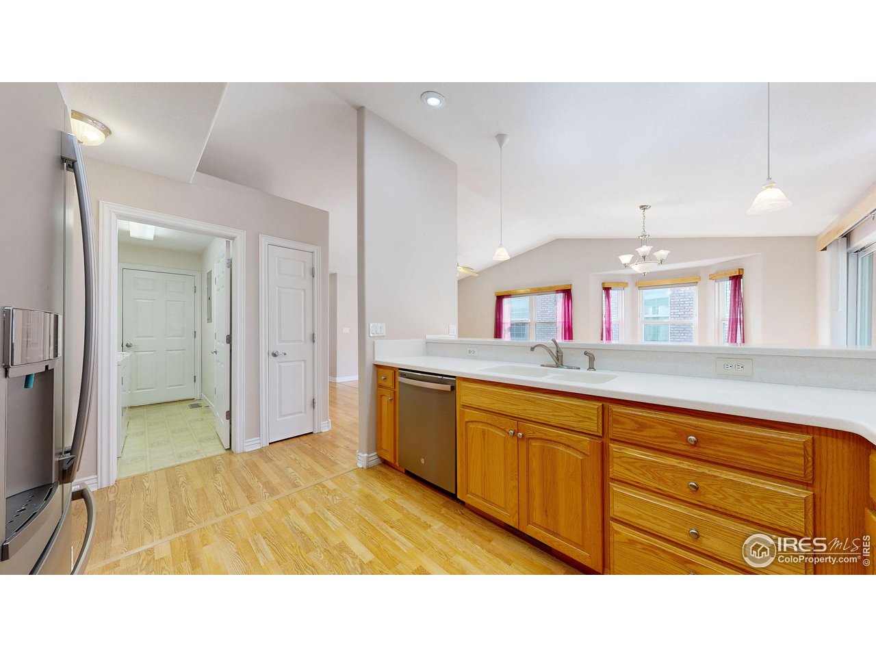 3585 West 20th Street Road Greeley, CO 80634 - Photo 15 of 32 a bathroom with a sink double vanity and a mirror