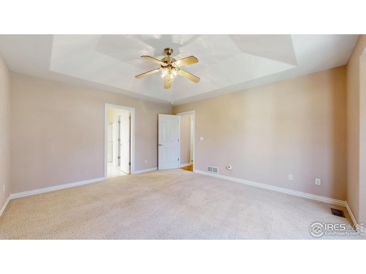 3585 West 20th Street Road Greeley, CO 80634 - Photo 16 of 32 a open hall with a ceiling fan