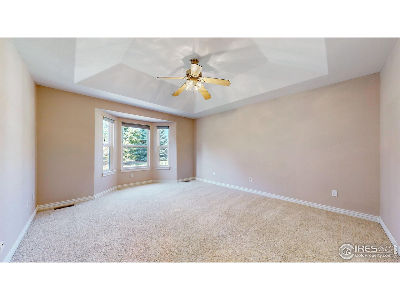 3585 West 20th Street Road Greeley, CO 80634 - Photo 18 of 32 a open hall with a ceiling fan