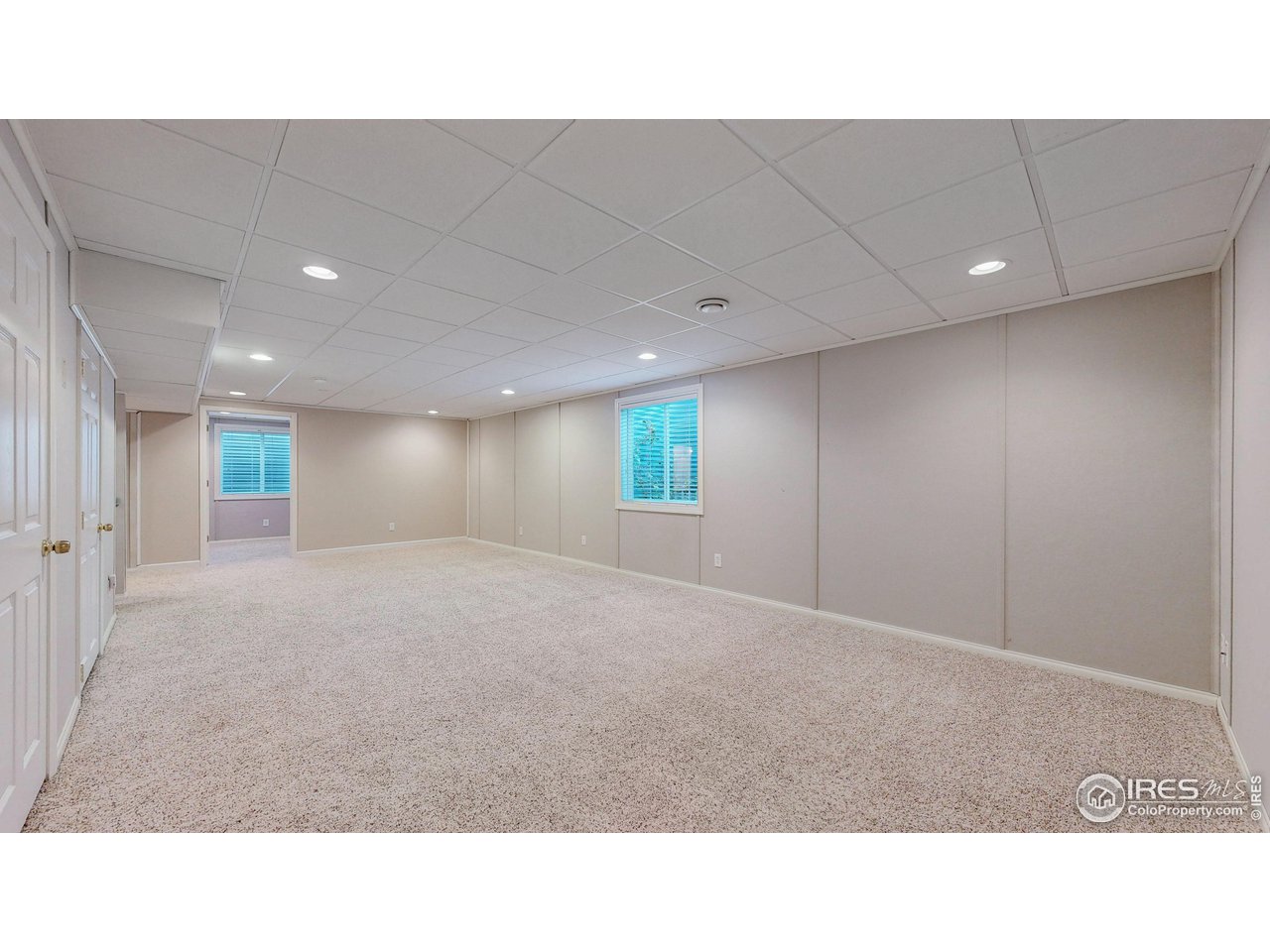 3585 West 20th Street Road Greeley, CO 80634 - Photo 20 of 32 a open hall with stairs