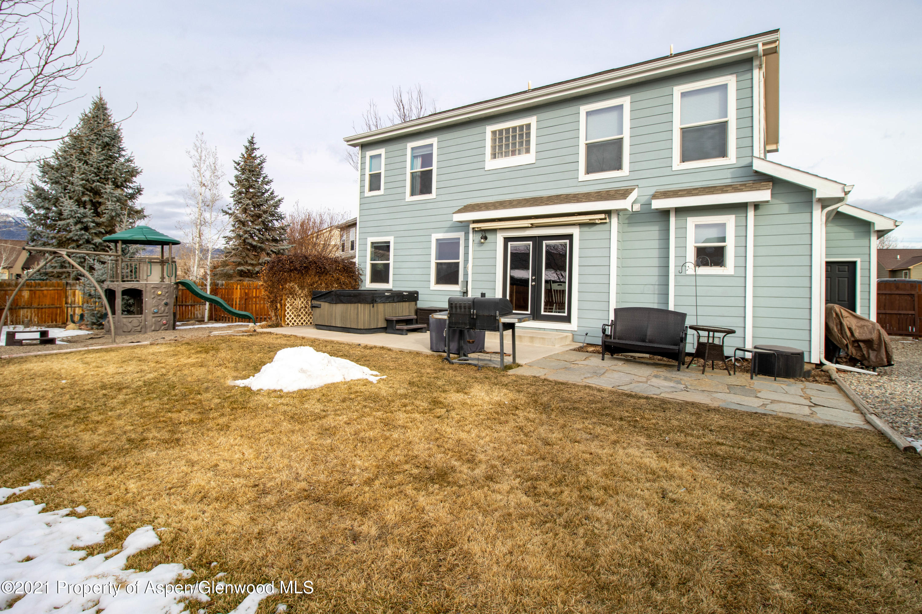 1259 East 18th Way Rifle, CO 81650 - Photo 16 of 17 a view of a house with a patio