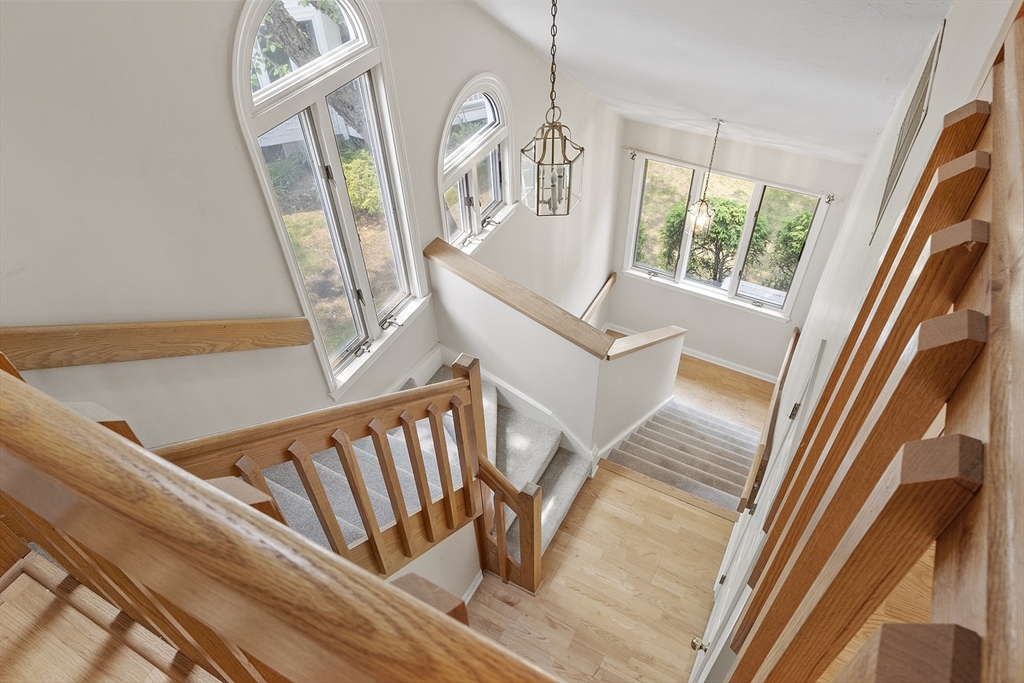 31 Pointe Rok Drive, Unit 31 Worcester, MA 01604 - Photo 19 of 32 a view of an entryway with wooden floor