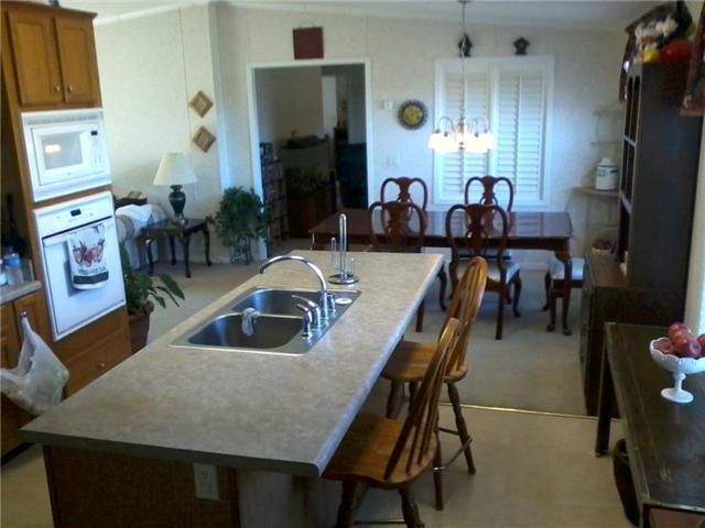 70 Ballenger Road Carthage, TN 37030 - Photo 4 of 11 Eat in kitchen makes it convenient for family gatherings. You could have the whole family over!