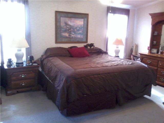 70 Ballenger Road Carthage, TN 37030 - Photo 6 of 11 This is a king size bed in the master bedroom. Lots of room in here!