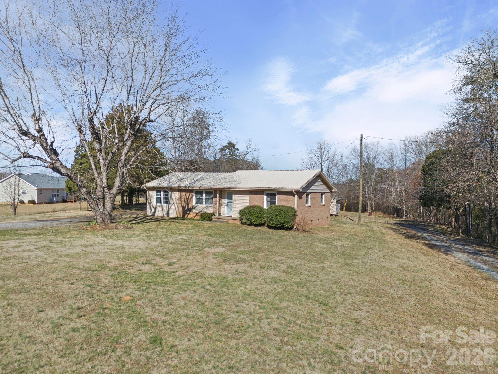 1429 Doggett Road Forest City, NC 28043 - Photo 1 of 33 a view of a house with a yard