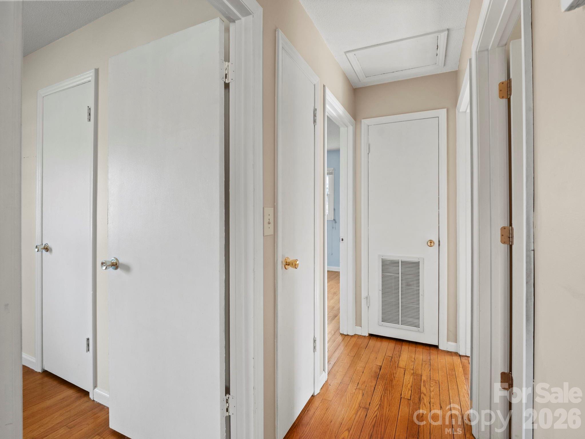 1429 Doggett Road Forest City, NC 28043 - Photo 18 of 33 a view of a hallway with wooden floor