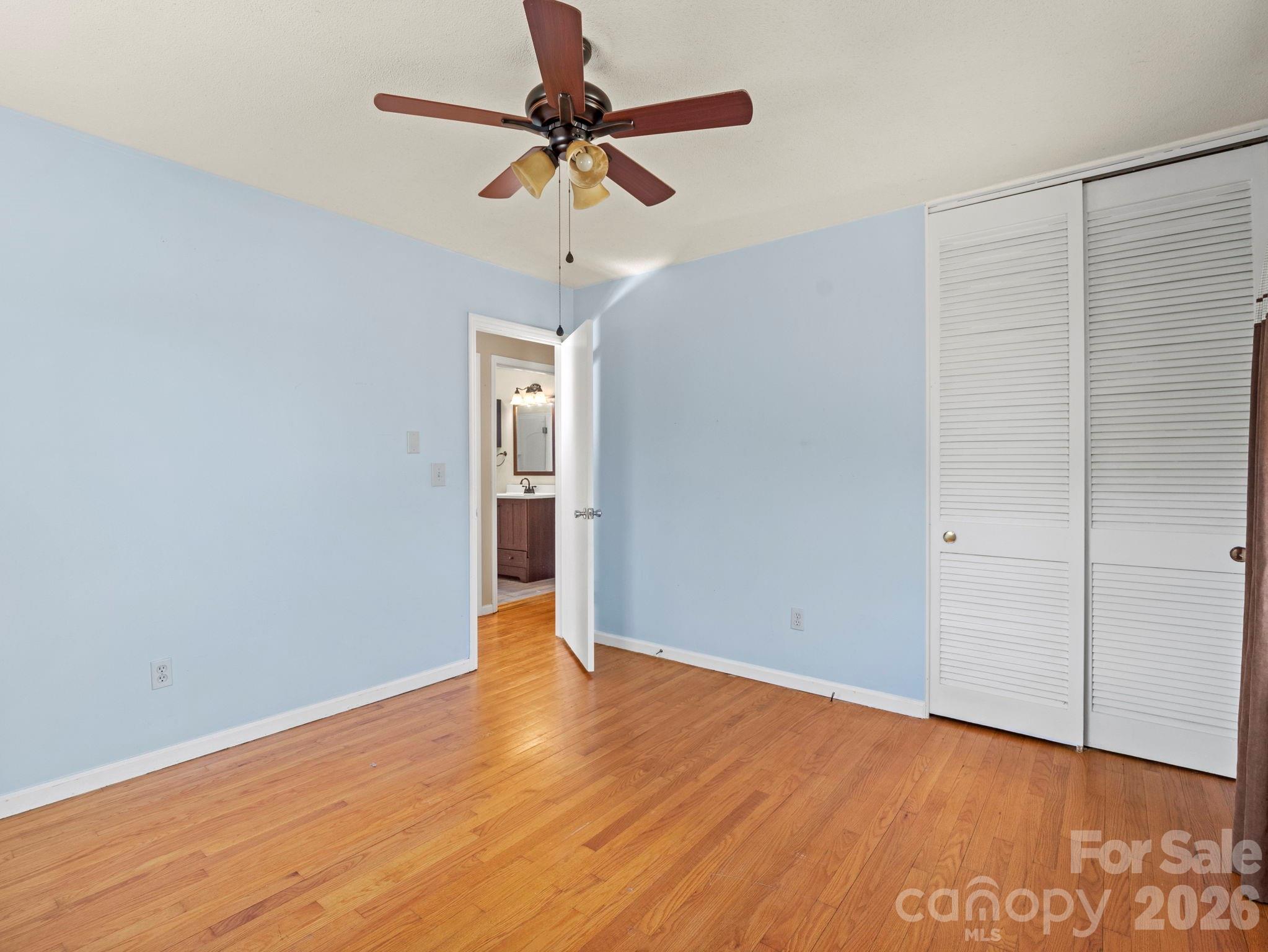 1429 Doggett Road Forest City, NC 28043 - Photo 22 of 33 a view of an empty room with wooden floor