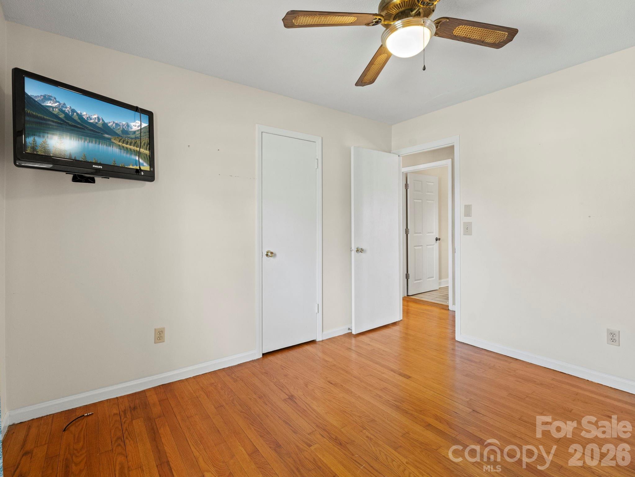 1429 Doggett Road Forest City, NC 28043 - Photo 24 of 33 a view of empty room with wooden floor