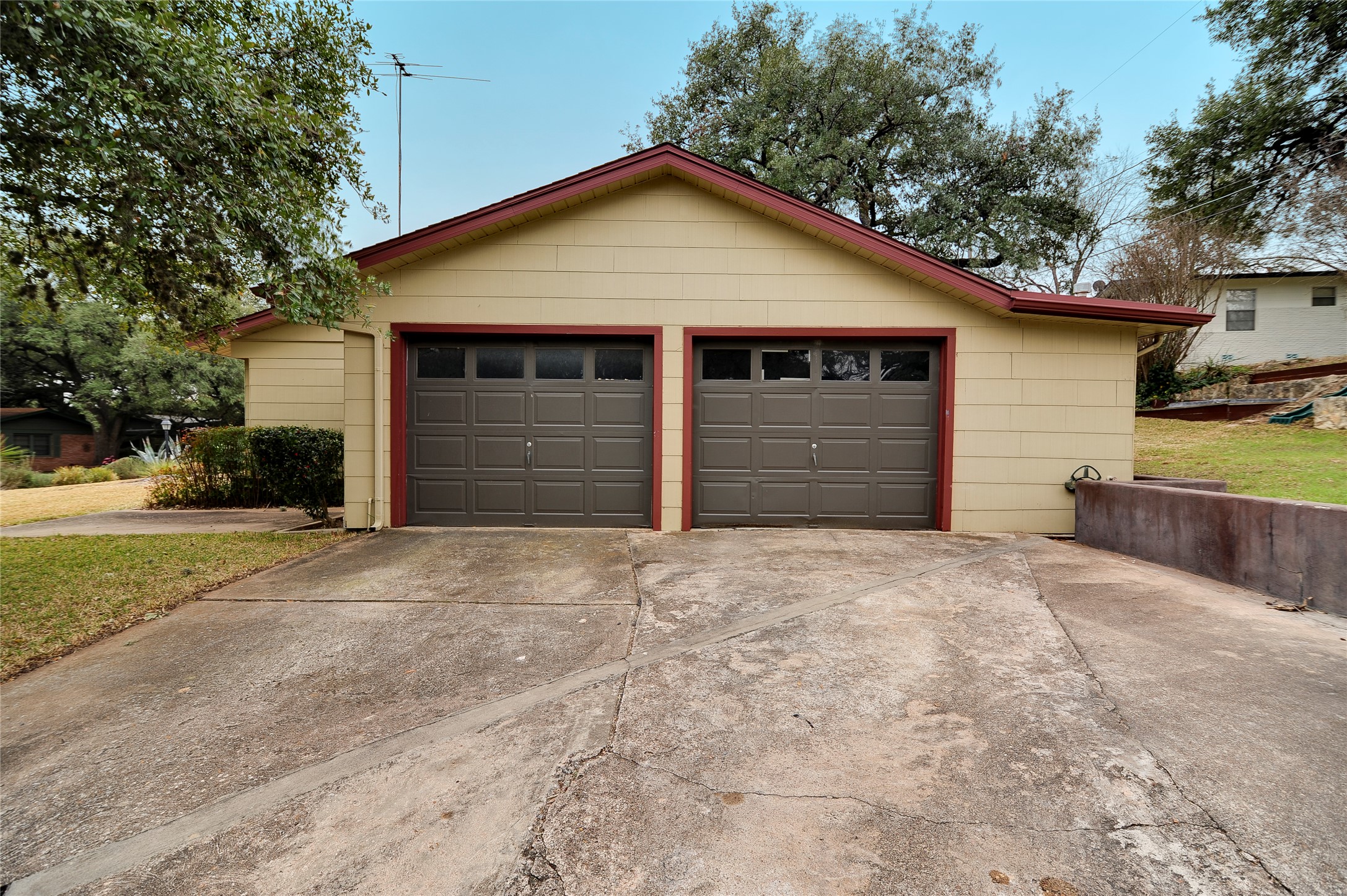 2300 Rebel Road Austin, TX 78704 - Photo 24 of 26 A spacious two-car garage offers convenient parking, washer and dryer connections, and extra storage options.