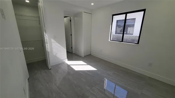 an empty room with windows
