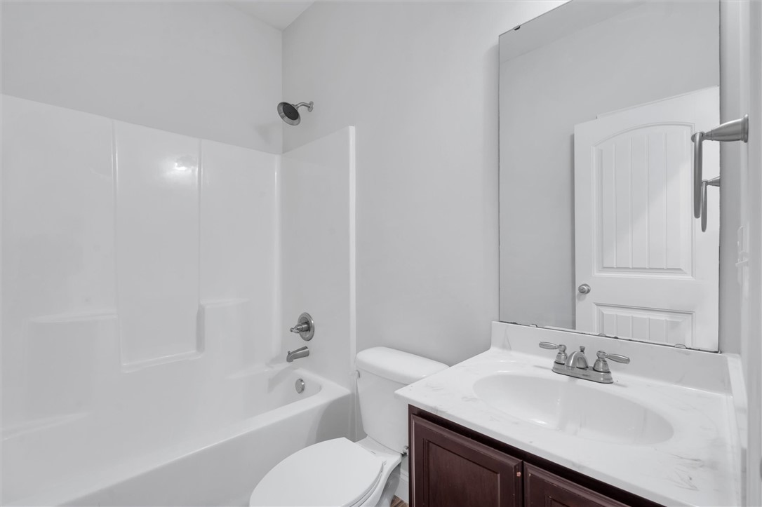 155 Norfolk Circle Anderson, SC 29625 - Photo 18 of 33 This bathroom features a sleek vanity and a tub shower combination for everyday comfort.