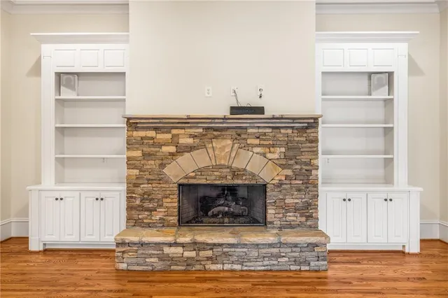 a kitchen with granite countertop a sink and a stove