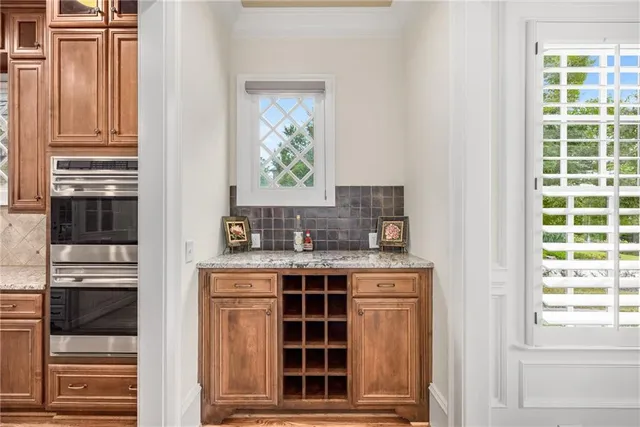 a bathroom with a tub shower and sink