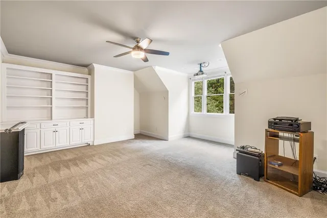 an aerial view of multiple houses with yard