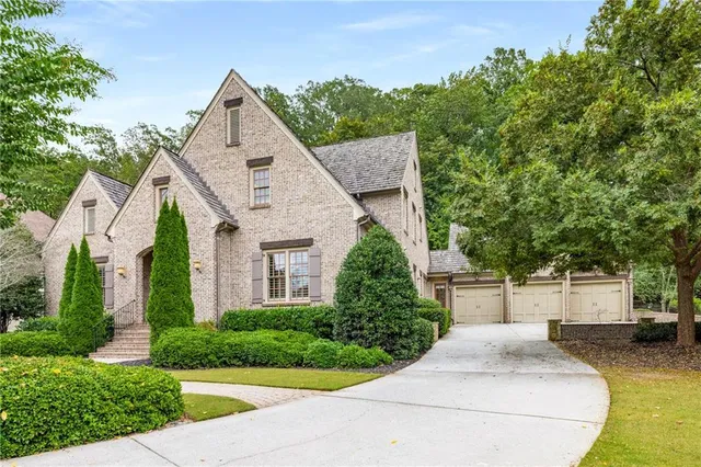 a front view of a house with a garage