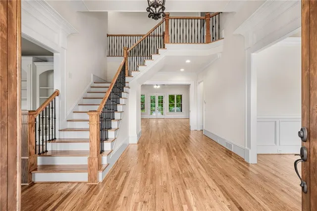 a view of front door with wooden door