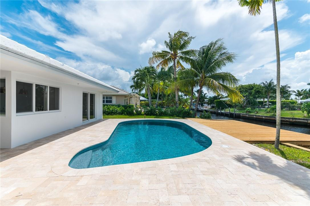 831 Hickory Terrace Boca Raton, FL 33486 - Photo 21 of 25 a view of swimming pool with a yard