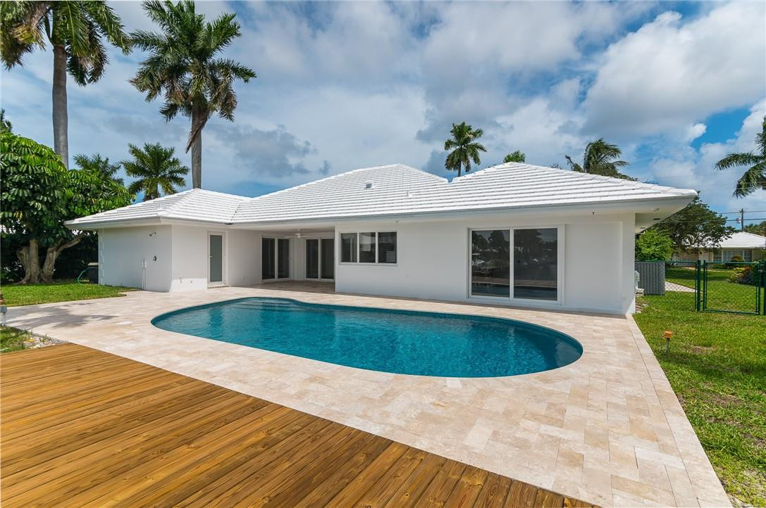 831 Hickory Terrace Boca Raton, FL 33486 - Photo 23 of 25 a front view of house with yard swimming pool and green space