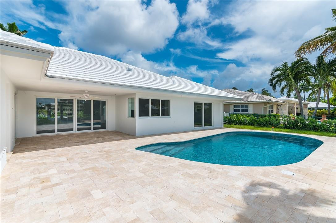 831 Hickory Terrace Boca Raton, FL 33486 - Photo 24 of 25 a view of outdoor space yard swimming pool and porch