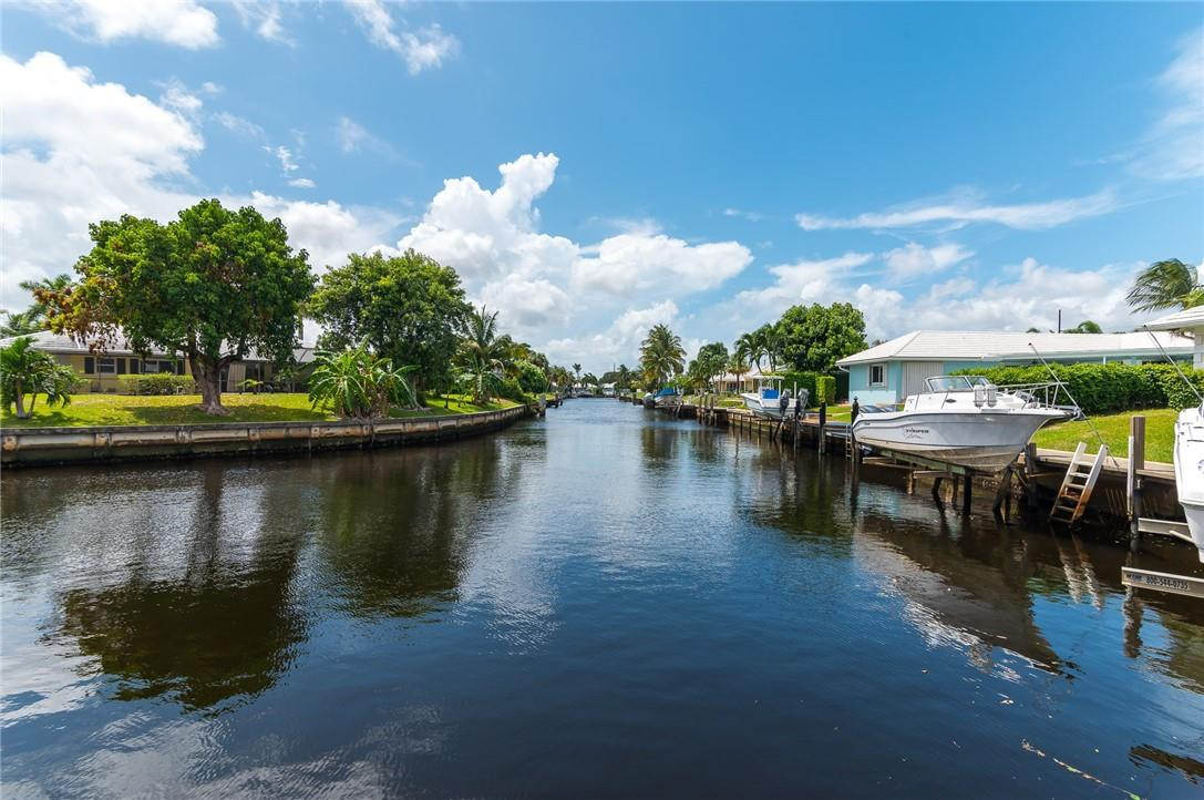 831 Hickory Terrace Boca Raton, FL 33486 - Photo 3 of 25 a view of a lake with boats