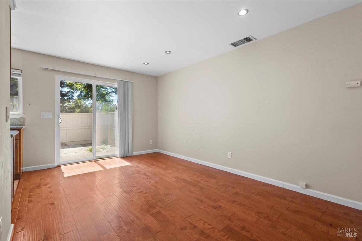 303 Algiers Court Santa Rosa, CA 95409 - Photo 8 of 27 The dining room is well positioned between the living room and accesses the backyard