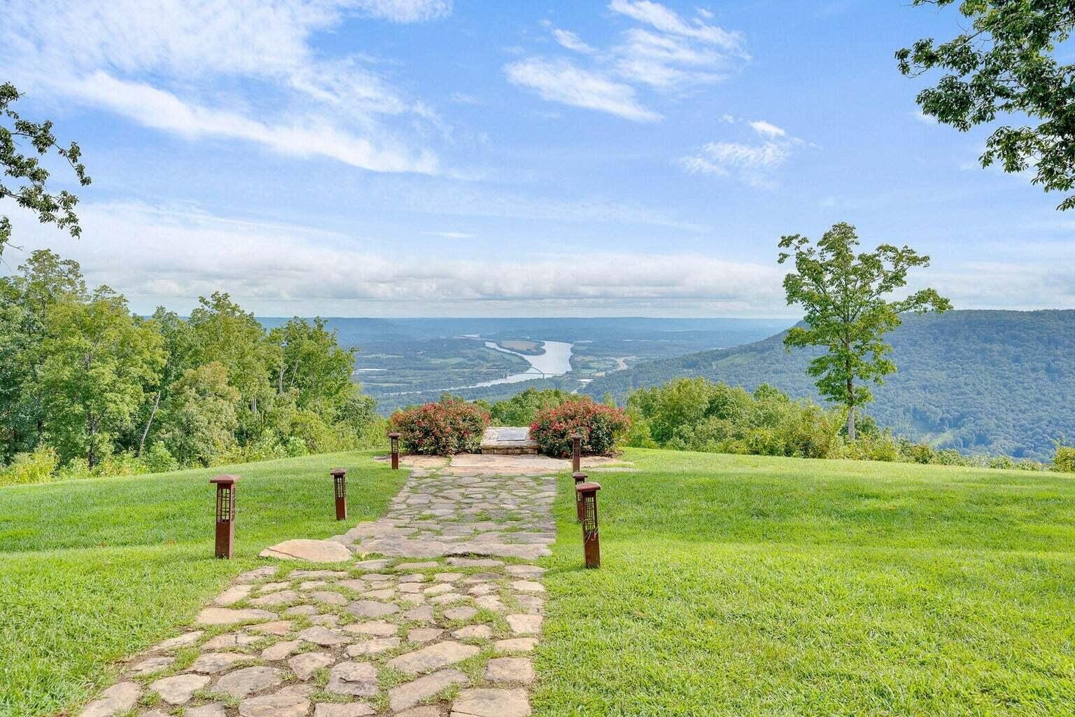 0 Raulston Fls Road Jasper, TN 37347 - Photo 29 of 38 a view of a garden with a building in the background