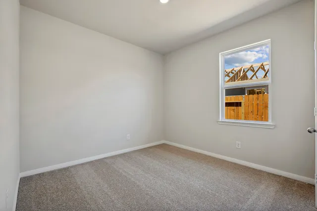 an empty room with window