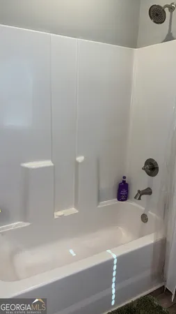 a bathroom with a bathtub