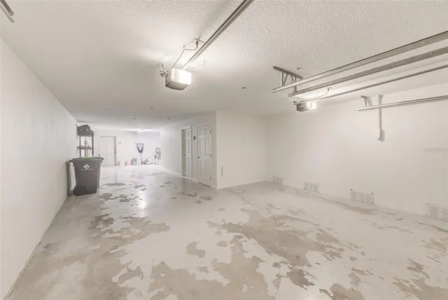 a view of a lake with houses in the back