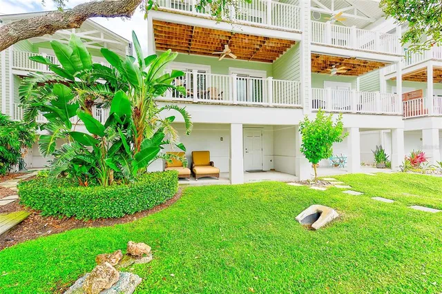 a view of a house with a street