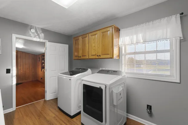 a utility room with washer and dryer