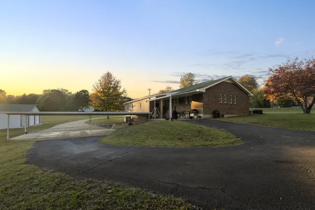 a view of house with outdoor space and street view