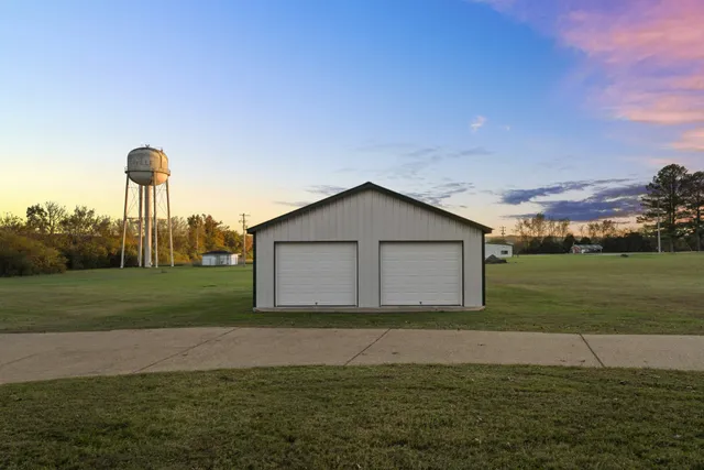 a house with garden in front of it