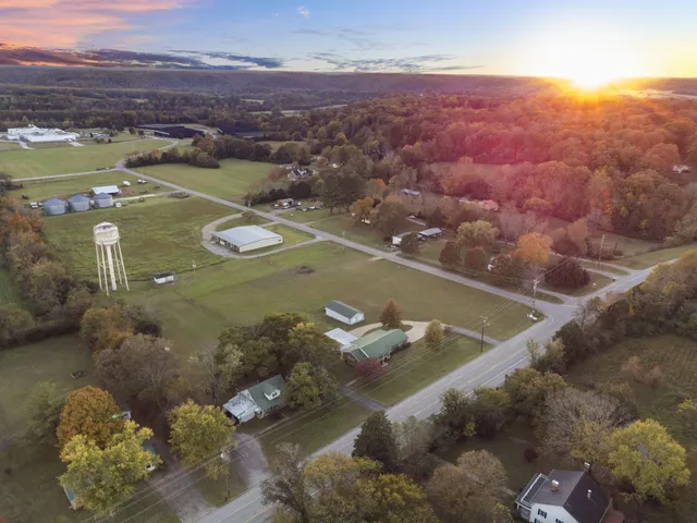 an aerial view of a house with a ocean view