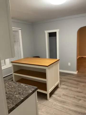 a room with a bed and a table