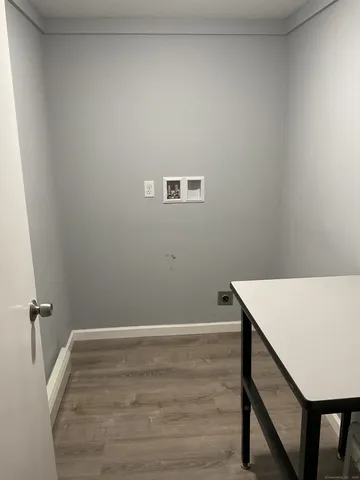 a view of a hallway with an empty space