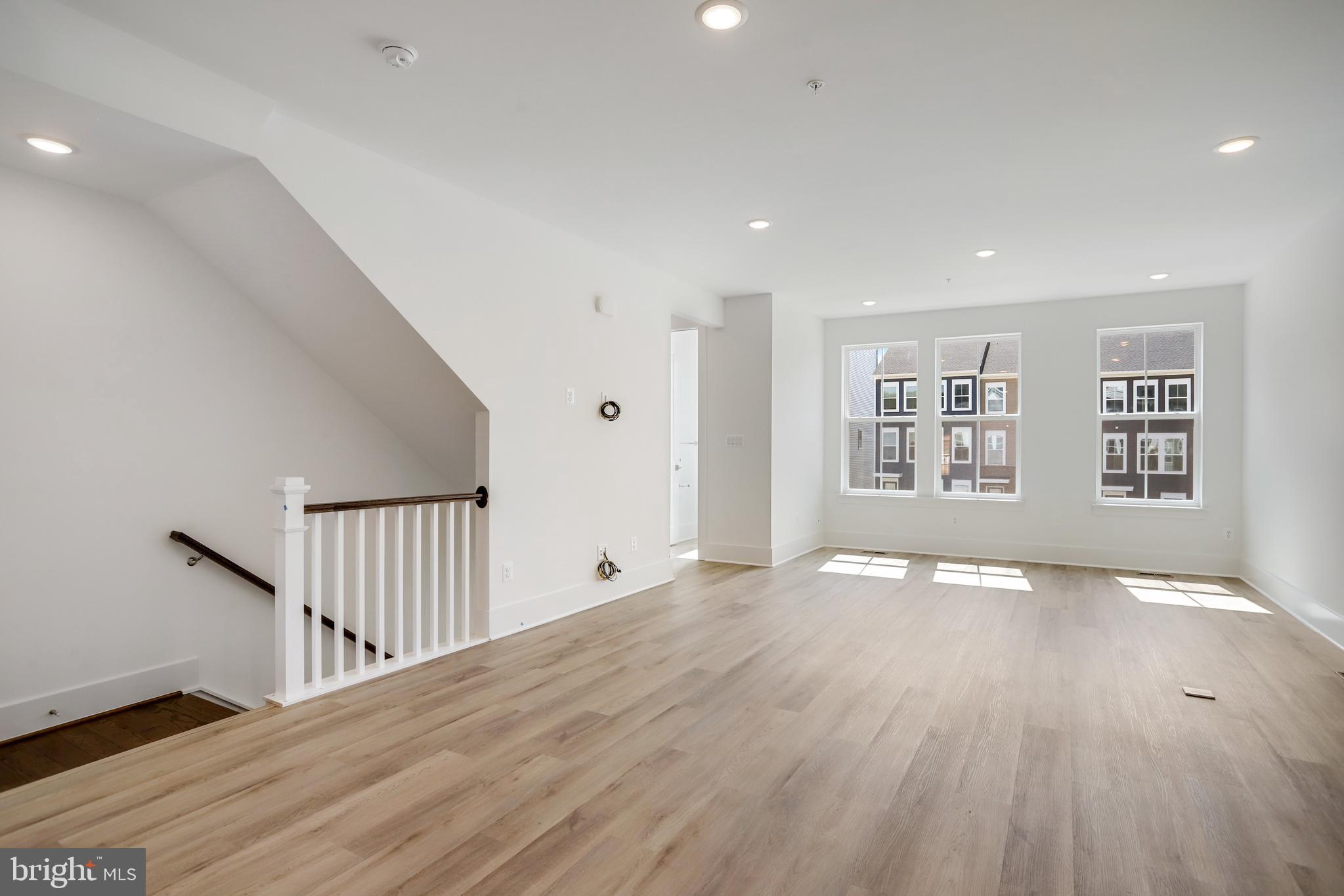 1859 Shookstown Road Frederick, MD 21702 - Photo 24 of 47 wooden floor in an empty room with a window
