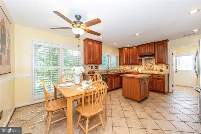 a view of a dining room kitchen and a window