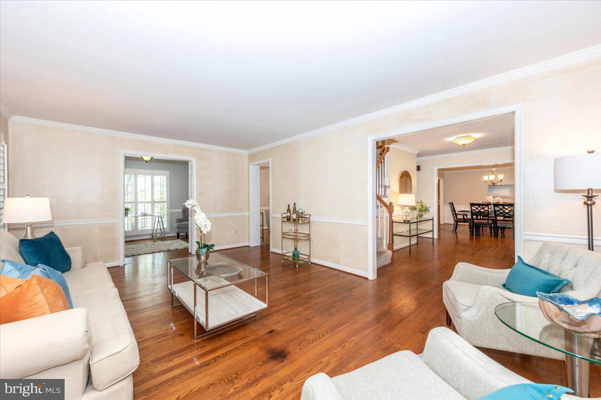 10 Megans Court Olney, MD 20832 - Photo 2 of 47 a living room with furniture and a wooden floor