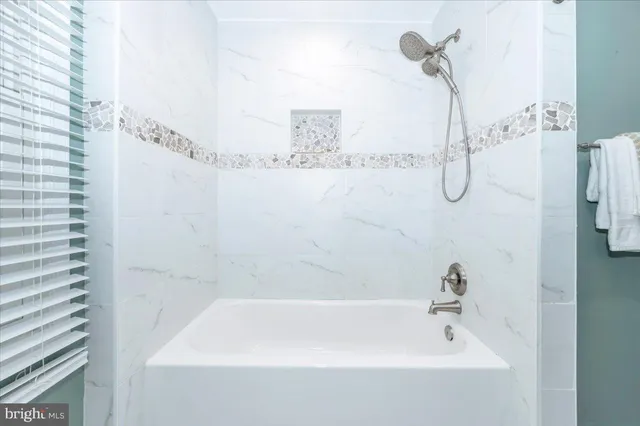 a bathroom with a bathtub