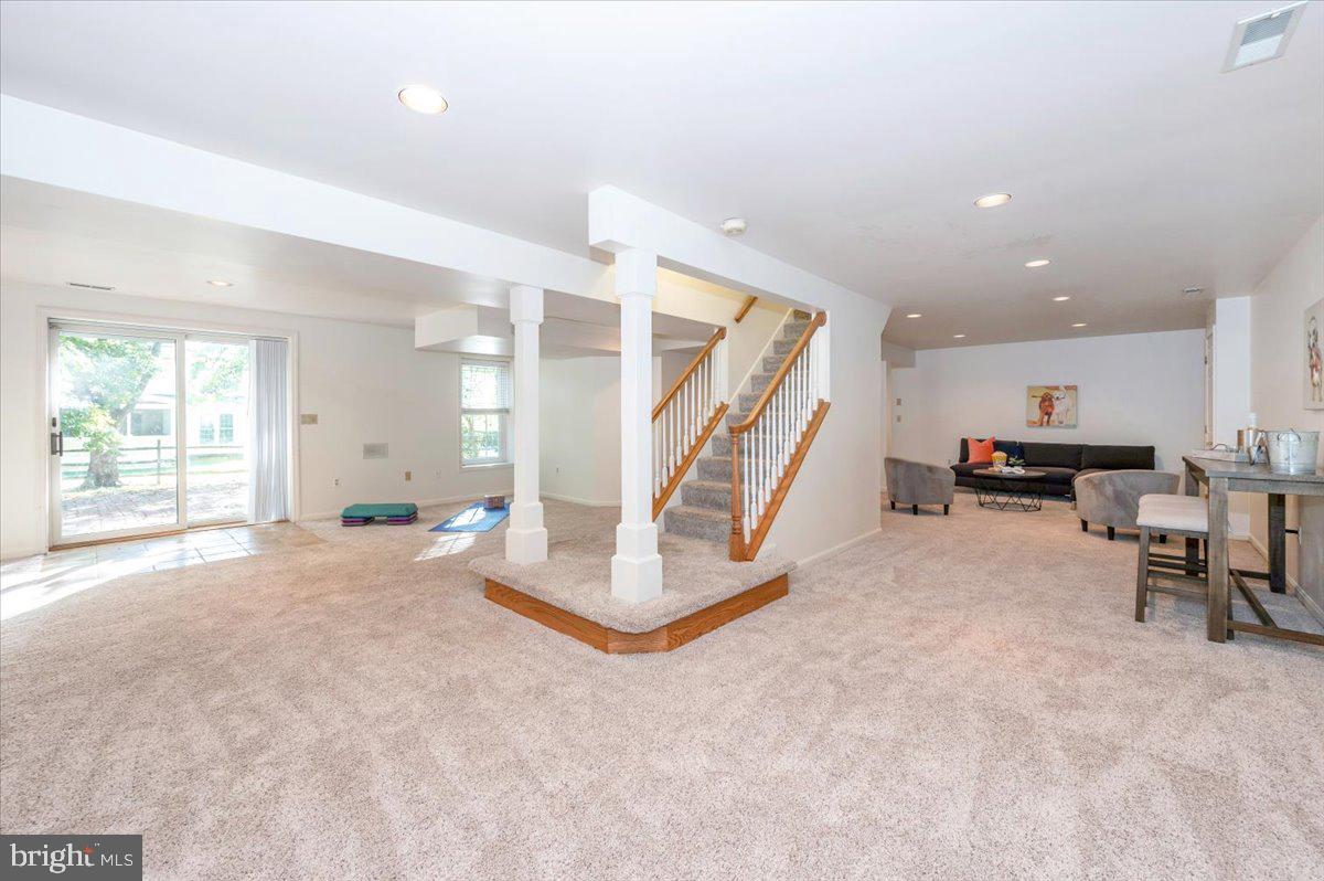 10 Megans Court Olney, MD 20832 - Photo 31 of 47 a view of a livingroom with furniture and a large window