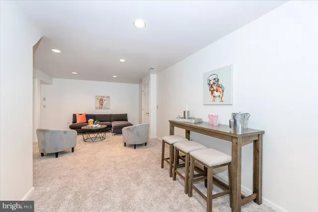 a view of a workspace with furniture