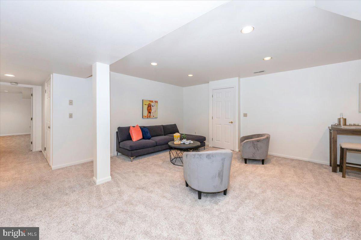 10 Megans Court Olney, MD 20832 - Photo 33 of 47 a living room with furniture and a table